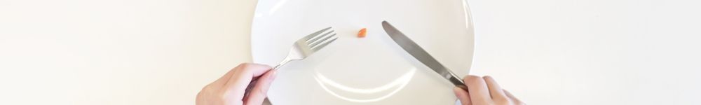 Small piece of food on a plate depicting ARFID