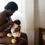 African American woman breastfeeding