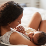 woman breastfeeding her baby