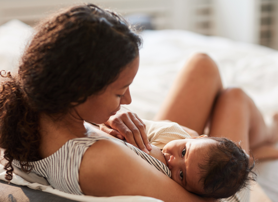 woman breastfeeding her baby