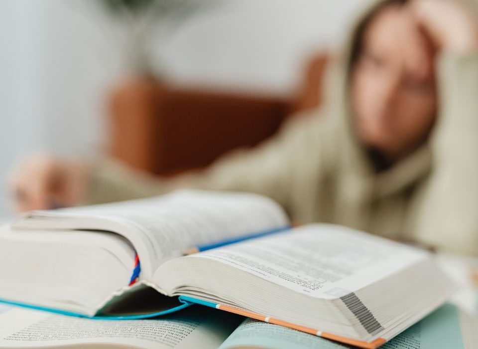 student studying while trying to overcome mental health issues