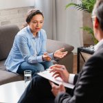 Woman discussing her co-occurring disorder with a therapist