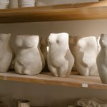 body image depicted in clay sculptures