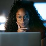 African American female exploring the different types of arfid on her computer