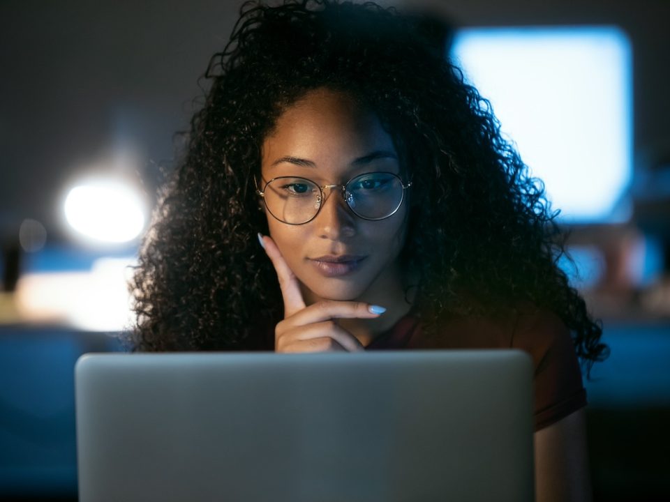 African American female exploring the different types of arfid on her computer