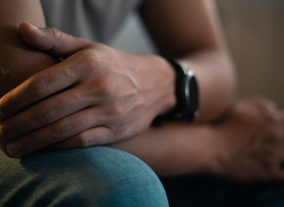 Man arms crossed dealing with mental health disorders