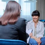 Young woman meeting with a therapist