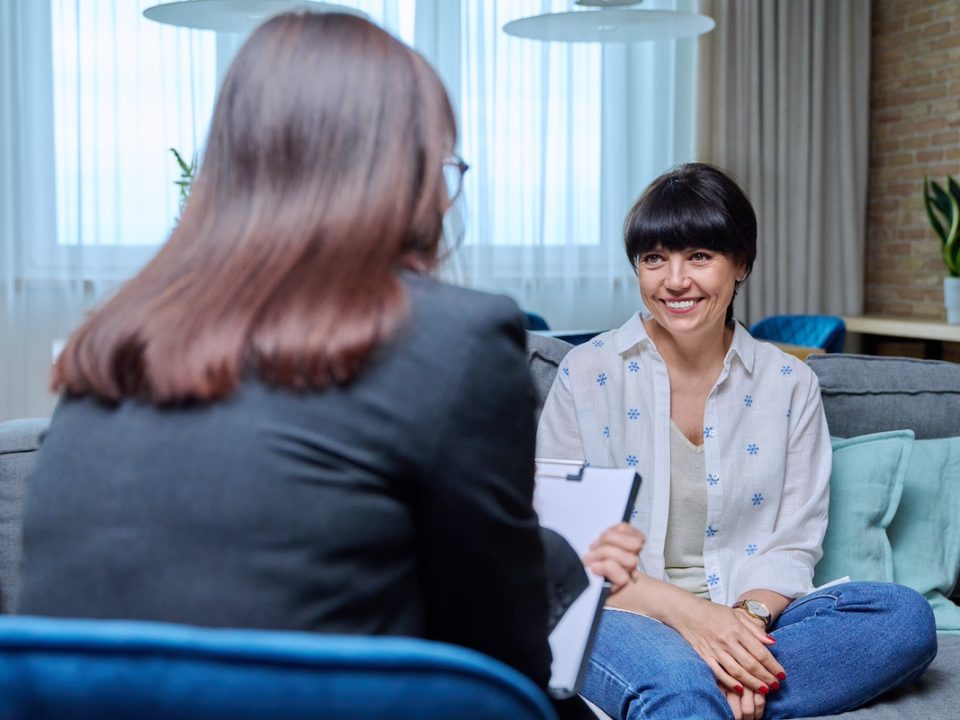 Young woman meeting with a therapist