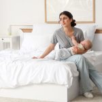 Mother suffering from either postpartum depression or the baby bllues
