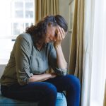 Senior woman trying to cope with a loss to suicide