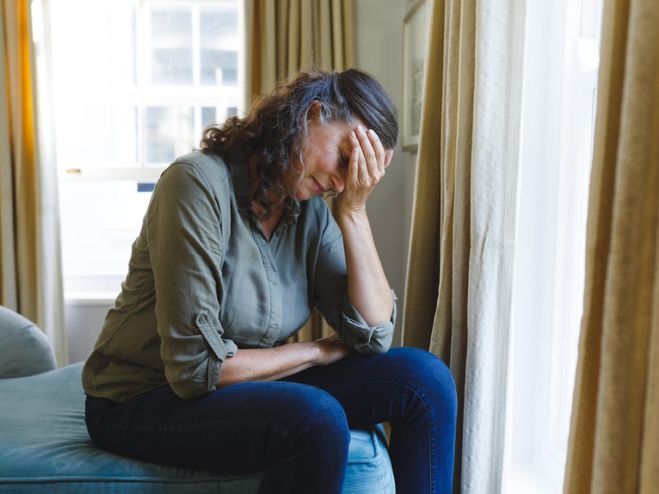 Senior woman trying to cope with a loss to suicide