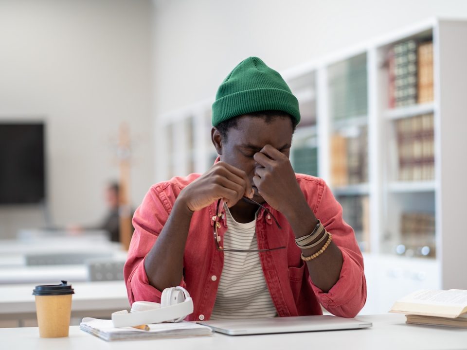 African American male college student dealing with mental health issues