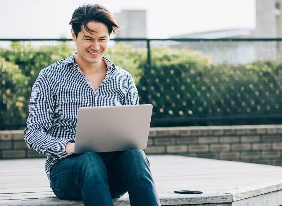 young adult man working, with a positive mental health day